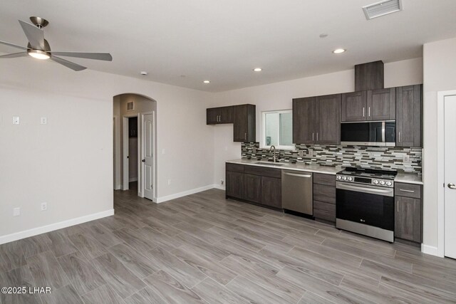 2080 Swanson Ave Unit F, Lake Havasu City, AZ 86403 - kitchen with ceiling fan, visible vents, light countertops, a sink, and stainless steel appliances