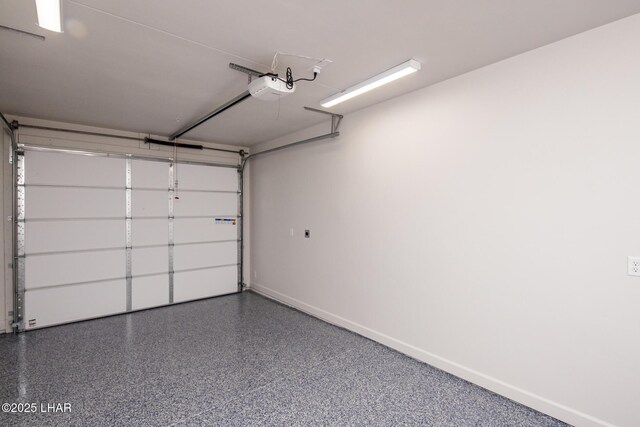 2080 Swanson Ave Unit F, Lake Havasu City, AZ 86403 - garage featuring baseboards and a garage door opener