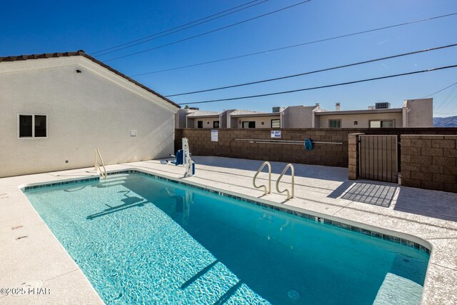 2080 Swanson Ave Unit F, Lake Havasu City, AZ 86403 - view of swimming pool with a fenced in pool, a patio area, fence, and a gate
