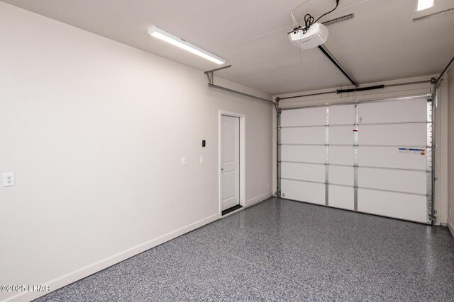 2080 Swanson Ave Unit F, Lake Havasu City, AZ 86403 - garage featuring baseboards and a garage door opener