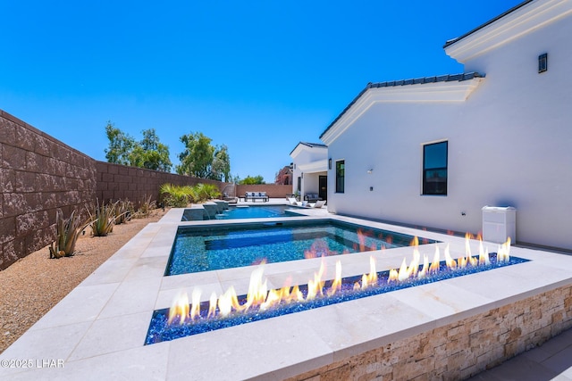 816 Isola Bella Loop, Lake Havasu City, AZ 86403 - view of pool featuring an outdoor fire pit, a fenced backyard, and a patio
