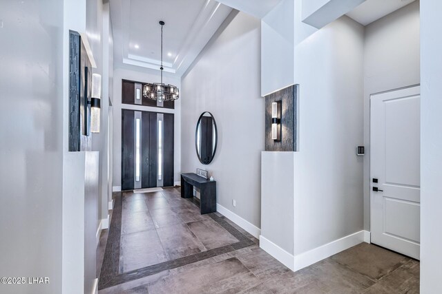 816 Isola Bella Loop, Lake Havasu City, AZ 86403 - foyer featuring a high ceiling, a chandelier, and recessed lighting
