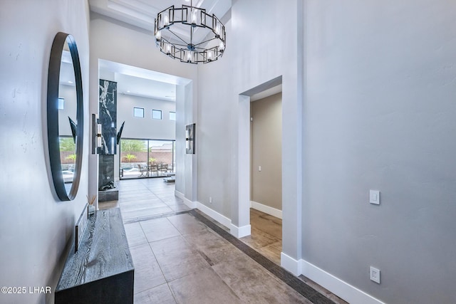 816 Isola Bella Loop, Lake Havasu City, AZ 86403 - foyer entrance with a chandelier and a high ceiling