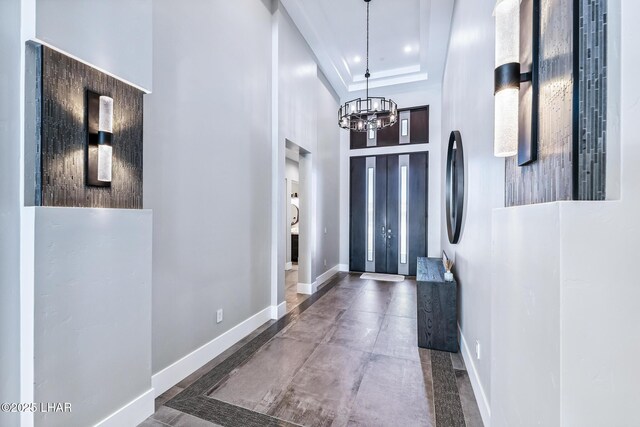 816 Isola Bella Loop, Lake Havasu City, AZ 86403 - entrance foyer featuring a chandelier, a towering ceiling, and recessed lighting