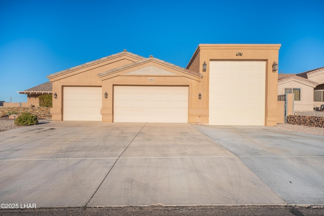 single story home featuring a garage