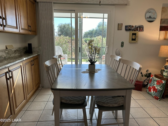 view of tiled dining area