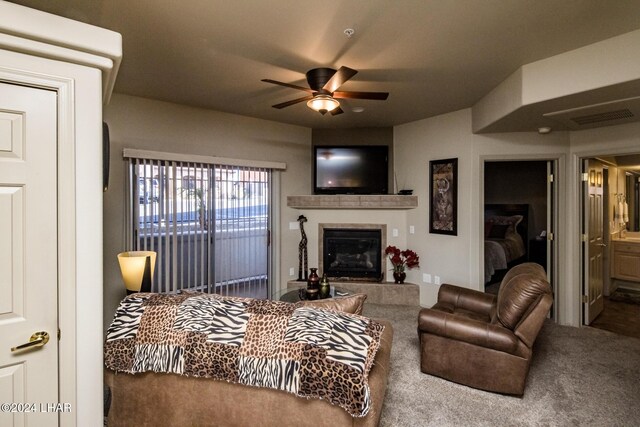 living room featuring ceiling fan and carpet flooring