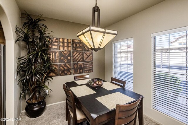 view of carpeted dining room