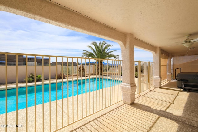 2624 Rainbow Ave N, Lake Havasu City, AZ 86403 - view of pool featuring a fenced in pool, fence, and ceiling fan