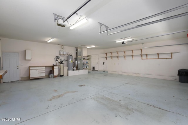 2624 Rainbow Ave N, Lake Havasu City, AZ 86403 - garage with a garage door opener and water heater