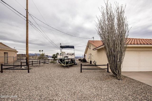 view of yard featuring a garage