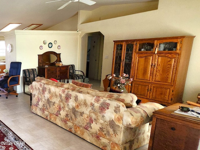 living room with lofted ceiling and ceiling fan