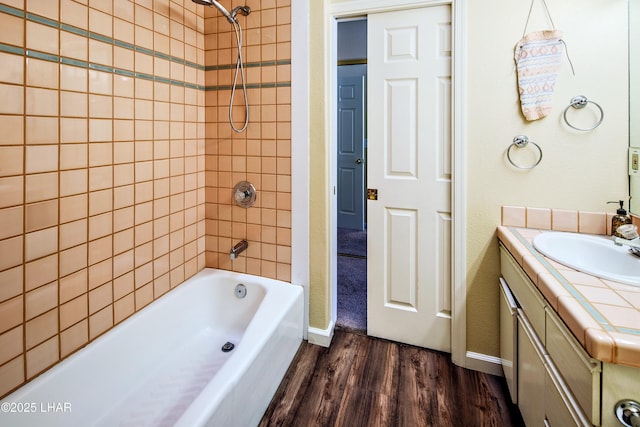 8731 Yaqui, Parker, AZ 85344 - bathroom featuring shower / washtub combination, wood finished floors, baseboards, and vanity