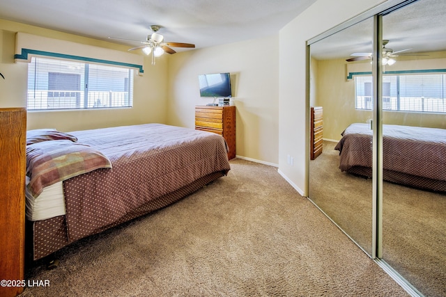 8731 Yaqui, Parker, AZ 85344 - bedroom with carpet flooring, baseboards, a closet, and ceiling fan