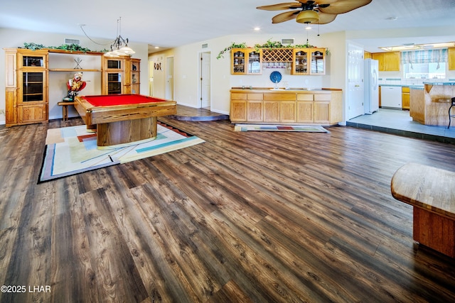 8731 Yaqui, Parker, AZ 85344 - game room with dark wood finished floors, baseboards, pool table, and a ceiling fan