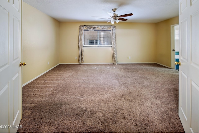 8731 Yaqui, Parker, AZ 85344 - spare room with baseboards, ceiling fan, carpet flooring, and a textured ceiling
