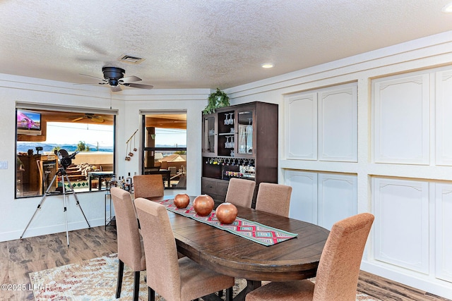 875 Wallingford Pl, Lake Havasu City, AZ 86406 - dining space featuring a textured ceiling, ceiling fan, light wood-style floors, and recessed lighting
