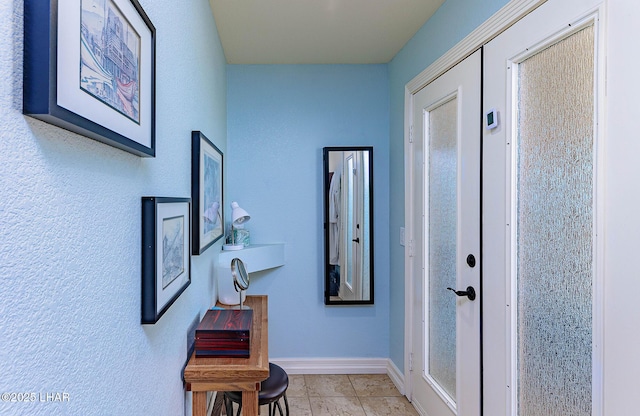 875 Wallingford Pl, Lake Havasu City, AZ 86406 - corridor with baseboards and tile patterned flooring