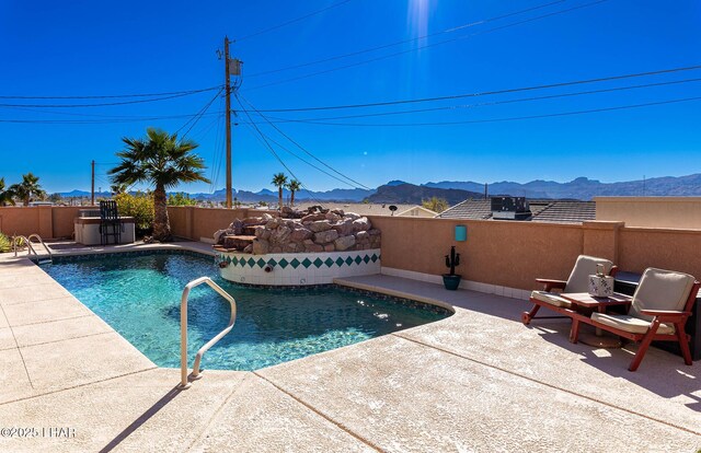 875 Wallingford Pl, Lake Havasu City, AZ 86406 - view of pool featuring a mountain view, a fenced backyard, and a patio area