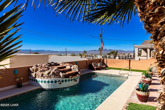 875 Wallingford Pl, Lake Havasu City, AZ 86406 - view of swimming pool with a mountain view, a fenced backyard, and a patio area