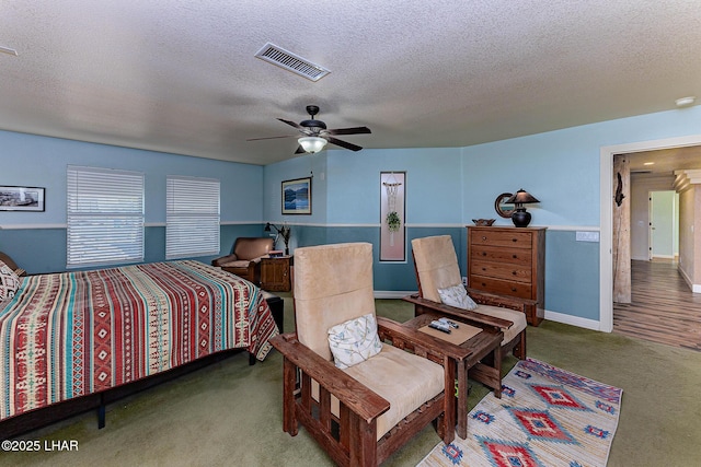 875 Wallingford Pl, Lake Havasu City, AZ 86406 - bedroom featuring carpet floors, a textured ceiling, and a ceiling fan