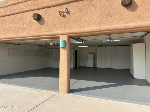 875 Wallingford Pl, Lake Havasu City, AZ 86406 - garage with freestanding refrigerator and driveway
