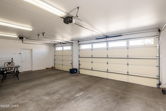 garage featuring a garage door opener