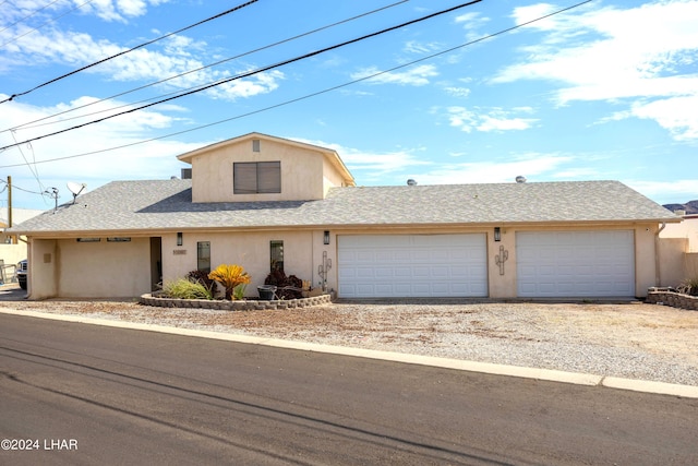 view of front of home with a garage