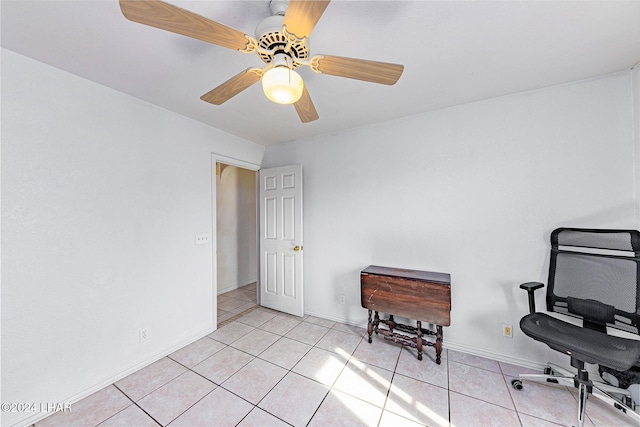 office space with light tile patterned flooring and ceiling fan