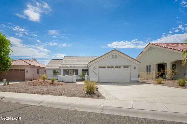 view of front of property with a garage