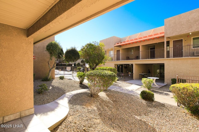 view of community with a patio area