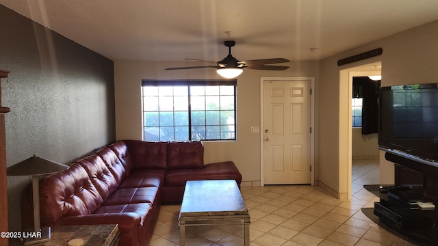 2095 Mesquite Ave Unit 27, Lake Havasu City, AZ 86403 - living area featuring ceiling fan, light tile patterned floors, and a textured wall