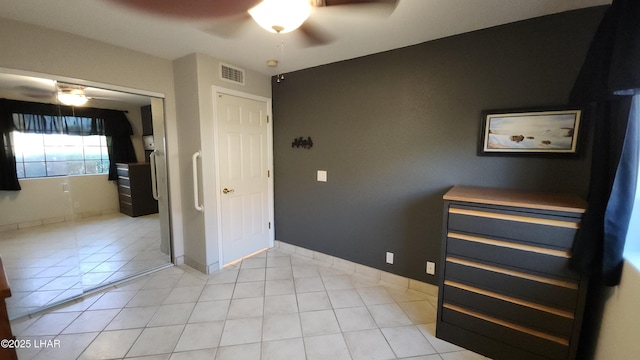 2095 Mesquite Ave Unit 27, Lake Havasu City, AZ 86403 - unfurnished bedroom with light tile patterned flooring and ceiling fan