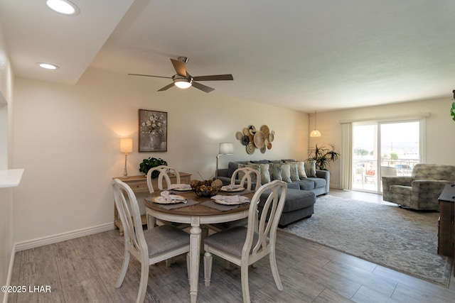 dining area featuring baseboards, a ceiling fan, recessed lighting, and wood finished floors