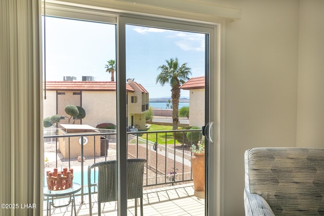 doorway featuring a water view