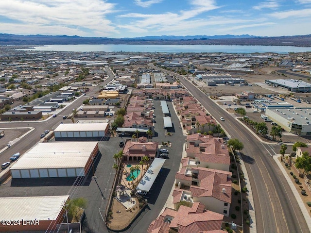 aerial view featuring a water and mountain view