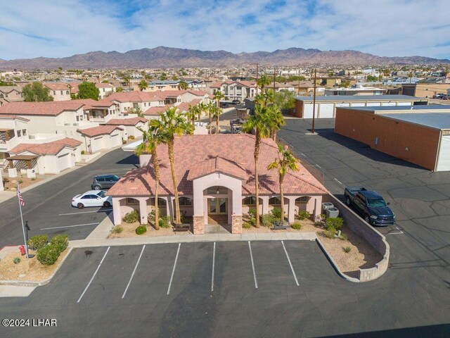 drone / aerial view featuring a mountain view