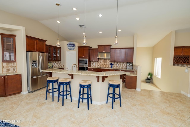 kitchen with stainless steel appliances, lofted ceiling, visible vents, glass insert cabinets, and under cabinet range hood