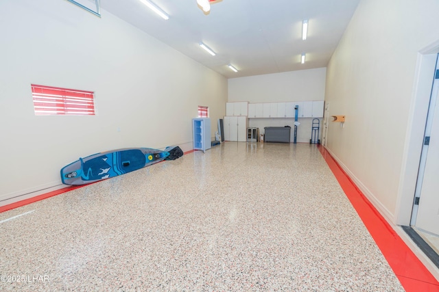 garage featuring baseboards