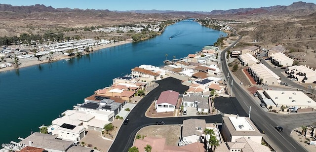 aerial view featuring a residential view and a water and mountain view