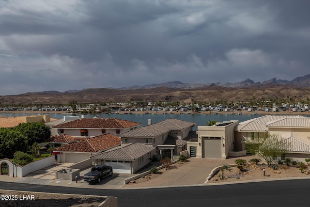 exterior space with a residential view and a mountain view