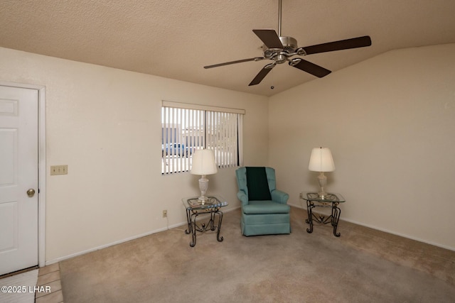 unfurnished room featuring baseboards, carpet flooring, ceiling fan, and lofted ceiling