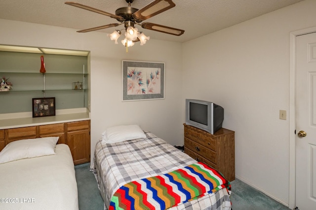 carpeted bedroom featuring a ceiling fan