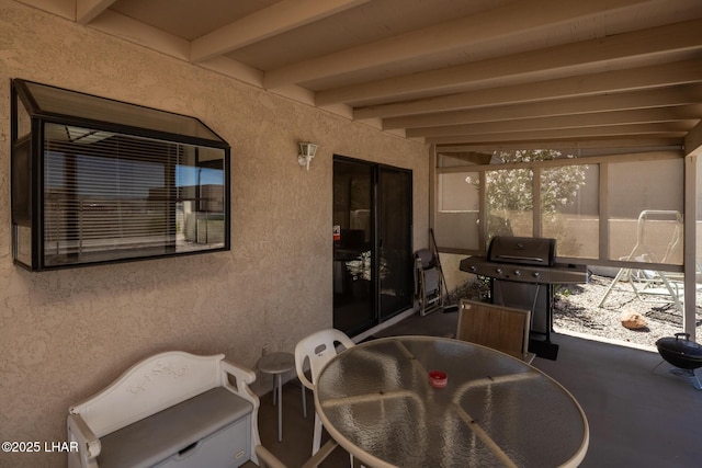 view of patio / terrace with area for grilling and outdoor dining area