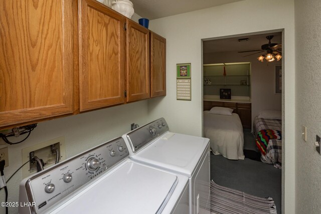 clothes washing area with cabinet space, independent washer and dryer, ceiling fan, and carpet
