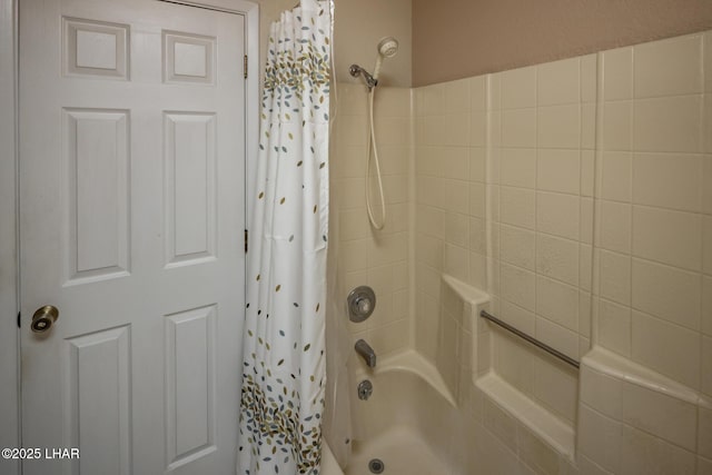 bathroom featuring shower / bathtub combination with curtain
