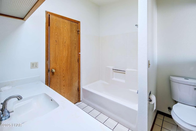 full bathroom featuring bathing tub / shower combination, vanity, tile patterned floors, and toilet