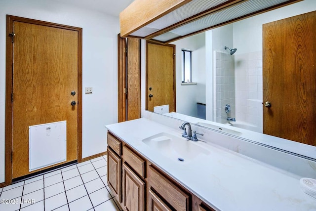 bathroom with vanity, tile patterned floors, and bathtub / shower combination