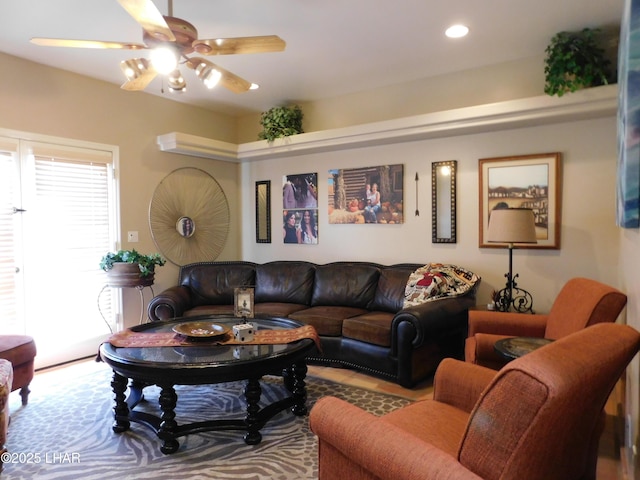 living room featuring ceiling fan