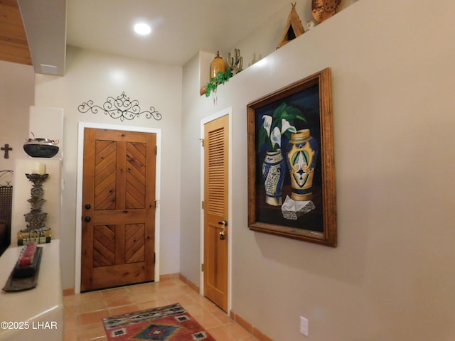 view of tiled foyer entrance